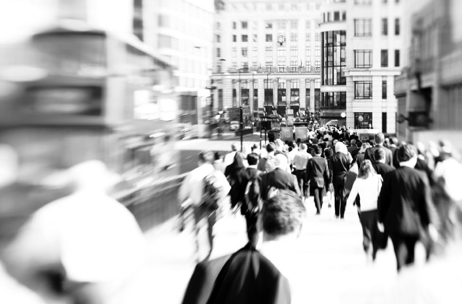 Blurred photograph of crowds walking through London