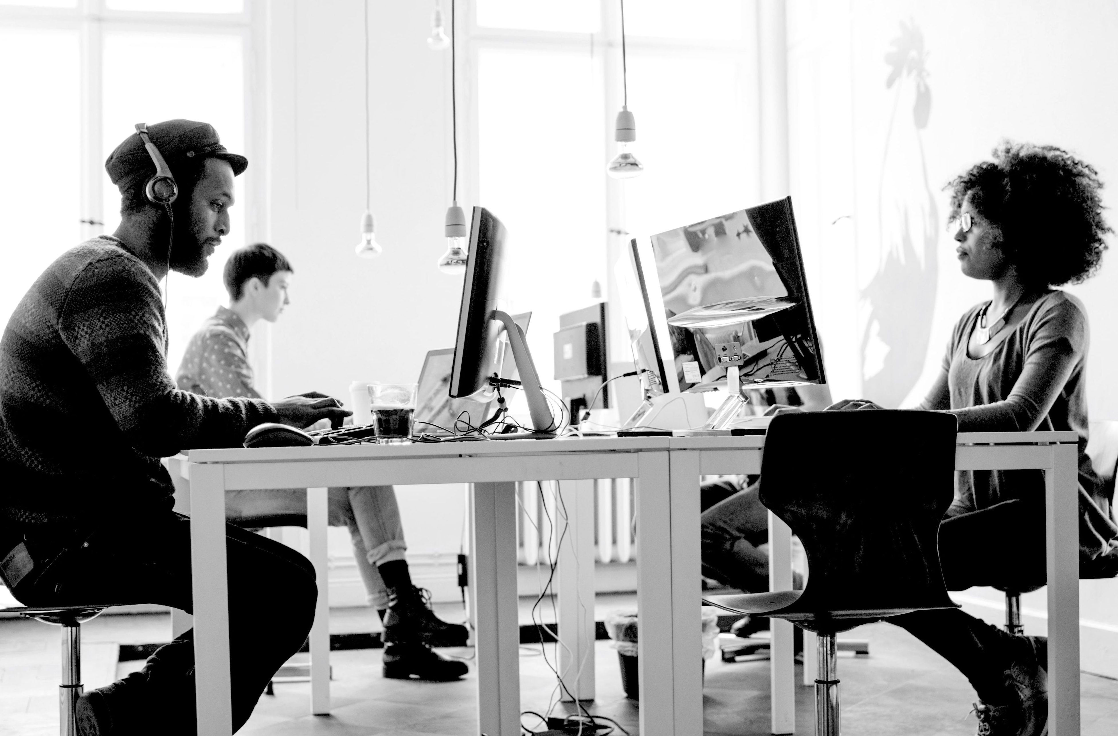 Young professionals working at desks in an office