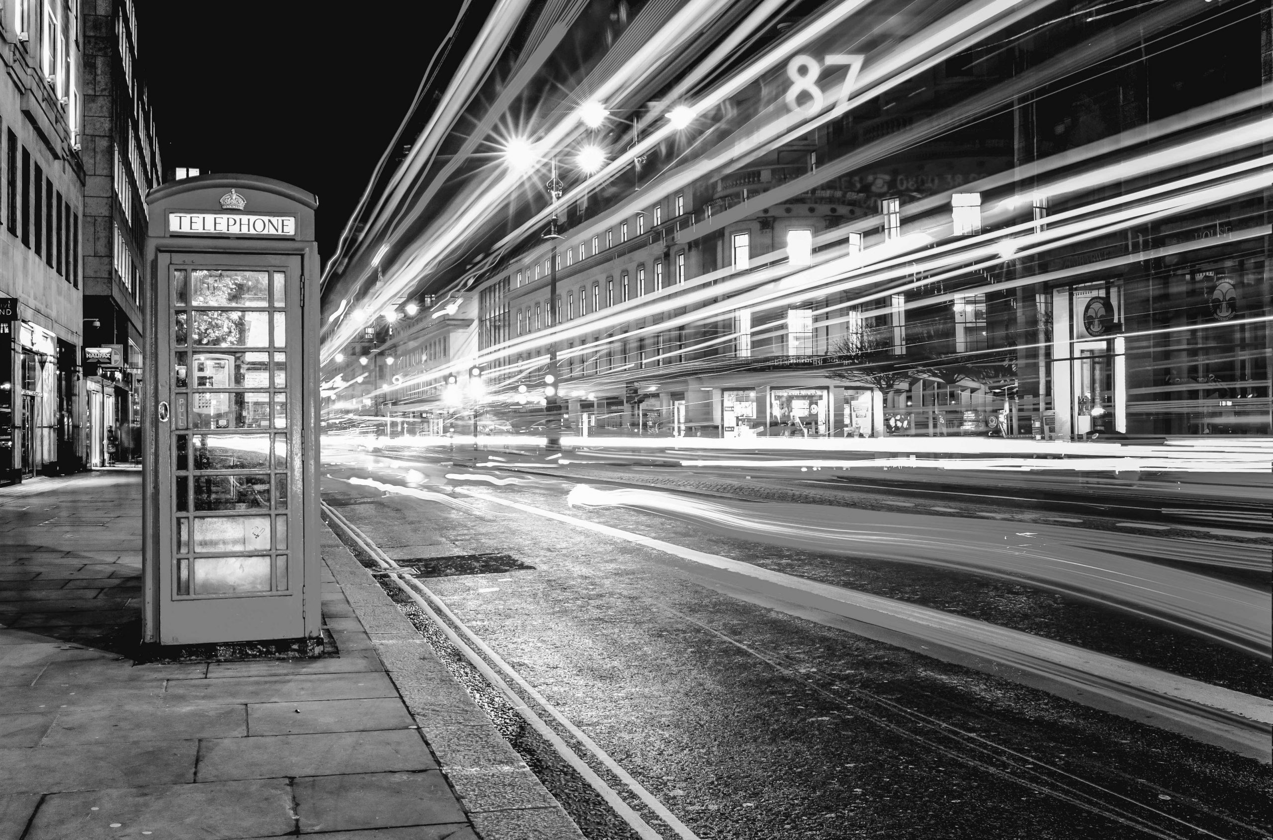 London street with phone box and bright lights