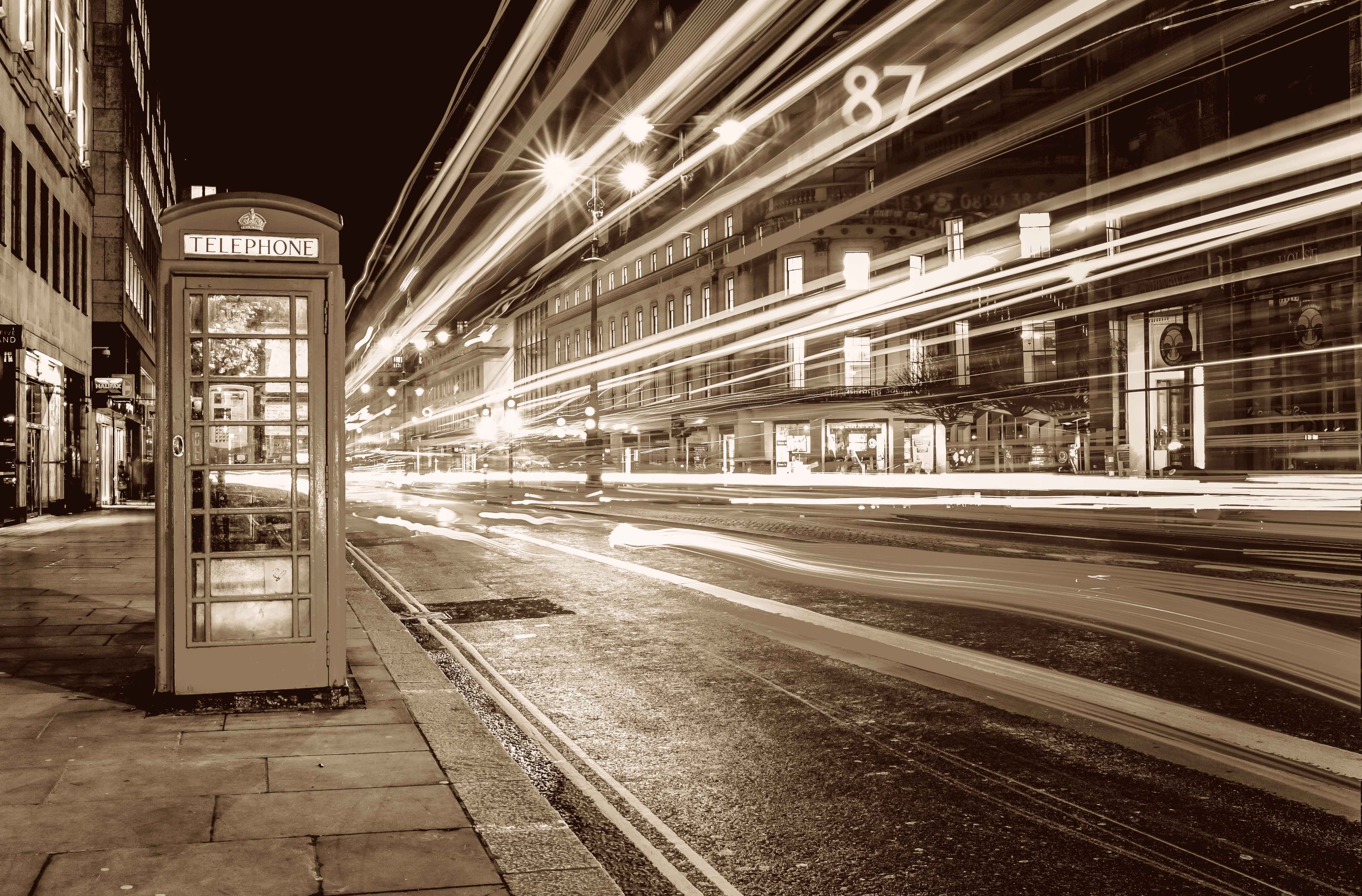 London street with phone box and bright lights