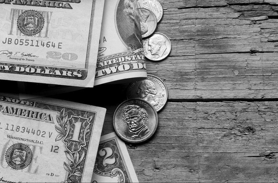 US dollars on a wooden table