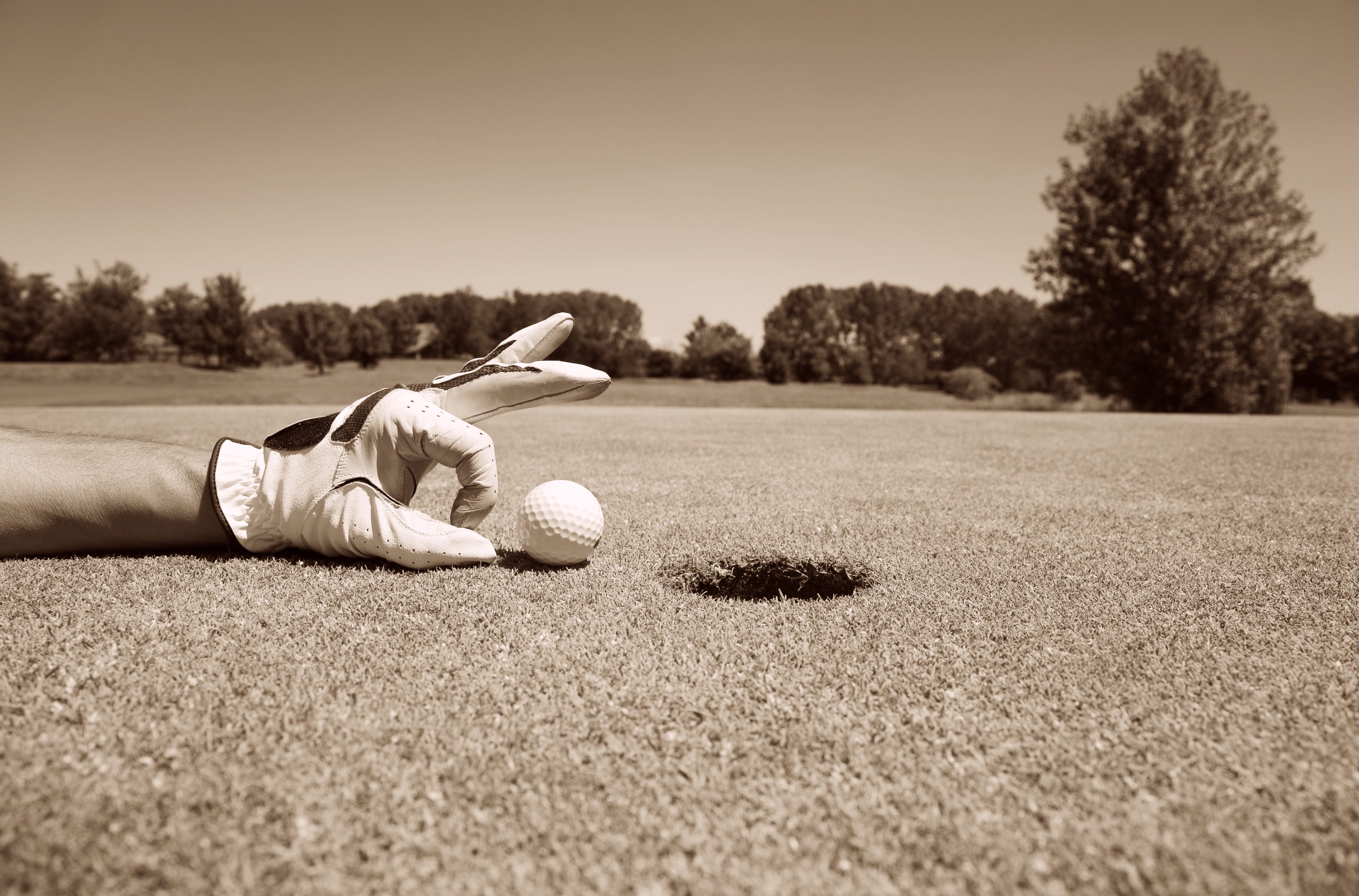 Golfer concentrating on the 19th hole